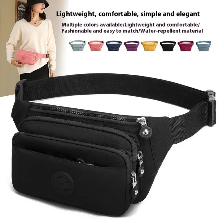 Black lightweight waist bag with multiple zippered compartments and adjustable strap, shown with model holding pink version