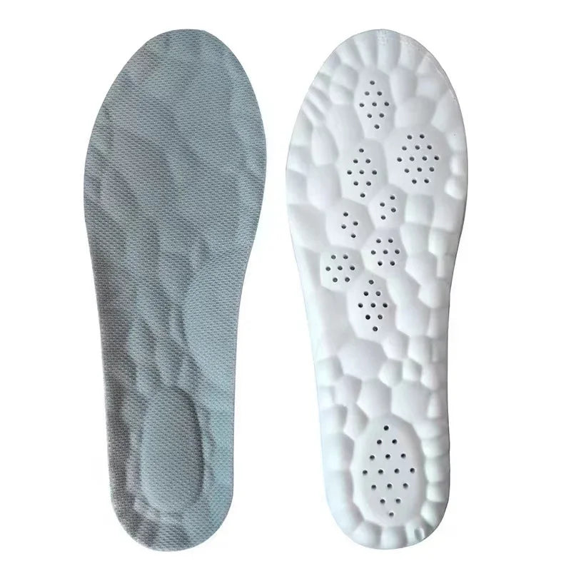 Pair of gray and white textured shoe insoles with perforated holes for breathability