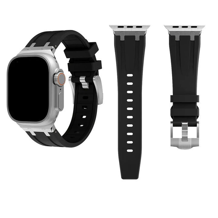 Silver smart watch with black silicone band and extra black watch straps isolated on white