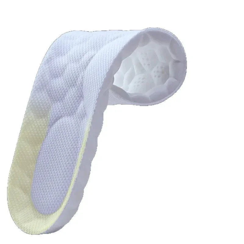 Close-up of a white padded breathable insole with textured surface and honeycomb cushioning