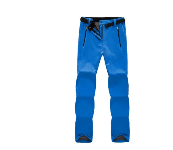 blue outdoor hiking pants with black belt and zippered pockets on white background