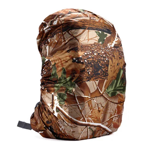 Camo backpack rain cover with brown, green, and tan forest leaf pattern