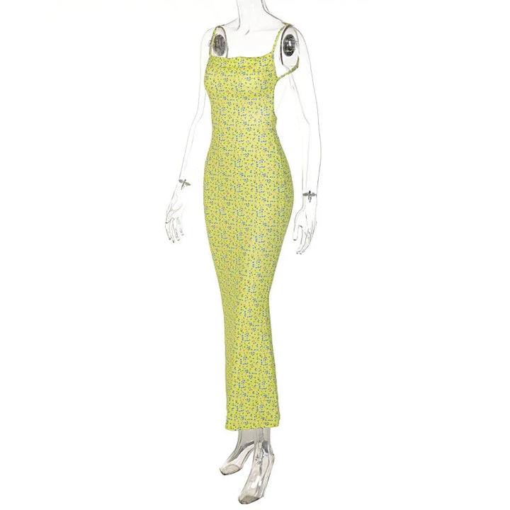 Yellow floral sleeveless maxi dress on transparent mannequin with fitted silhouette
