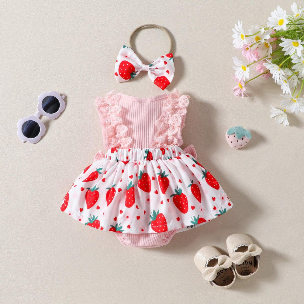 Baby girl pink strawberry dress with ruffle sleeves, matching bow headband, sunglasses, shoes, and flower background