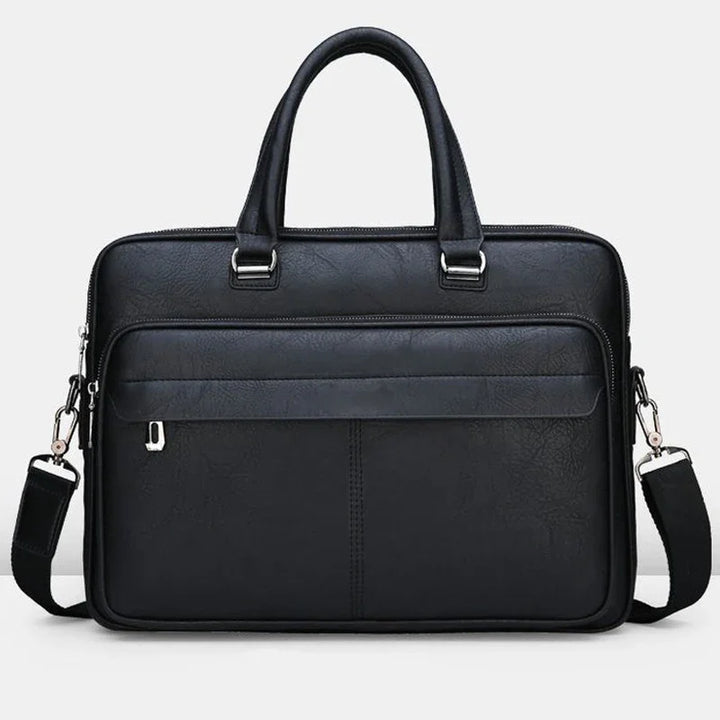 Black leather briefcase with top handles, front zipper pocket, and detachable shoulder strap