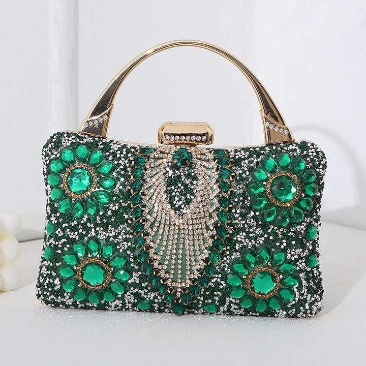 Elegant black clutch handbag embellished with green and clear rhinestones and gold-tone handle