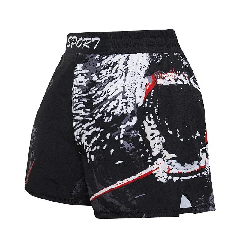 Black sport shorts with abstract white and red graphic print and elastic waistband