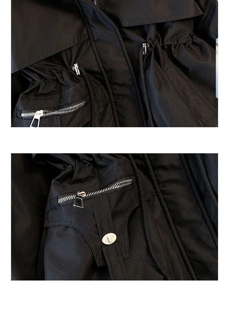Close-up details of a black jacket with silver zippers, drawstrings, and button accents