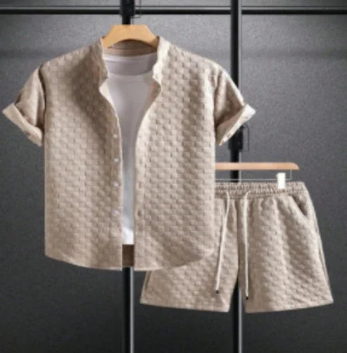 Beige textured short-sleeve shirt and matching shorts set with white inner T-shirt on wooden hangers