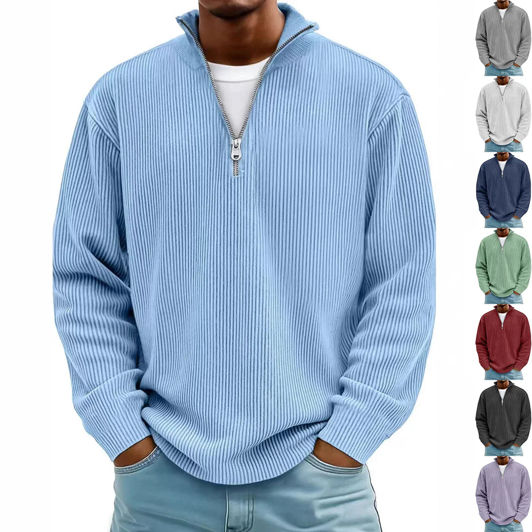 Man wearing light blue ribbed half-zip pullover sweater in casual style with hands in pockets
