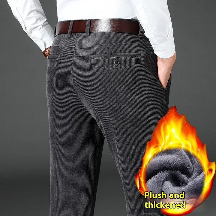 Man wearing gray corduroy pants with brown leather belt and white shirt, plush and thickened fabric feature