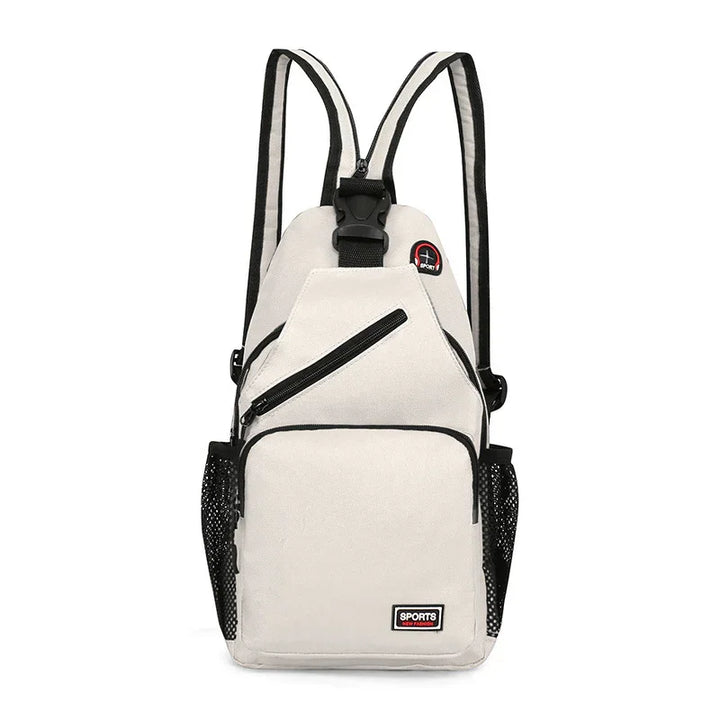 Beige sports sling backpack with black trim, zippered pockets, mesh side pockets, and adjustable straps