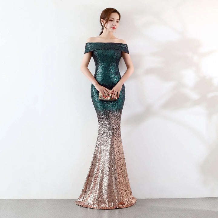Woman in off-shoulder green to rose gold sequin mermaid gown holding gold clutch