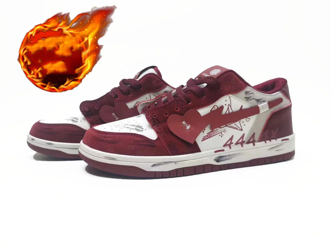 maroon and white low-top sneakers with graffiti design and 444 number detail