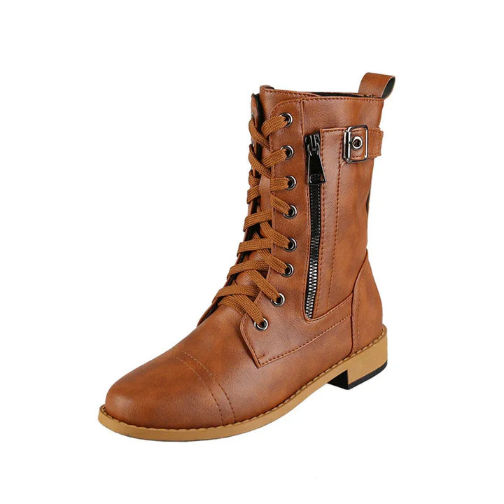 brown leather lace-up ankle boot with side zipper and buckle detail on white background