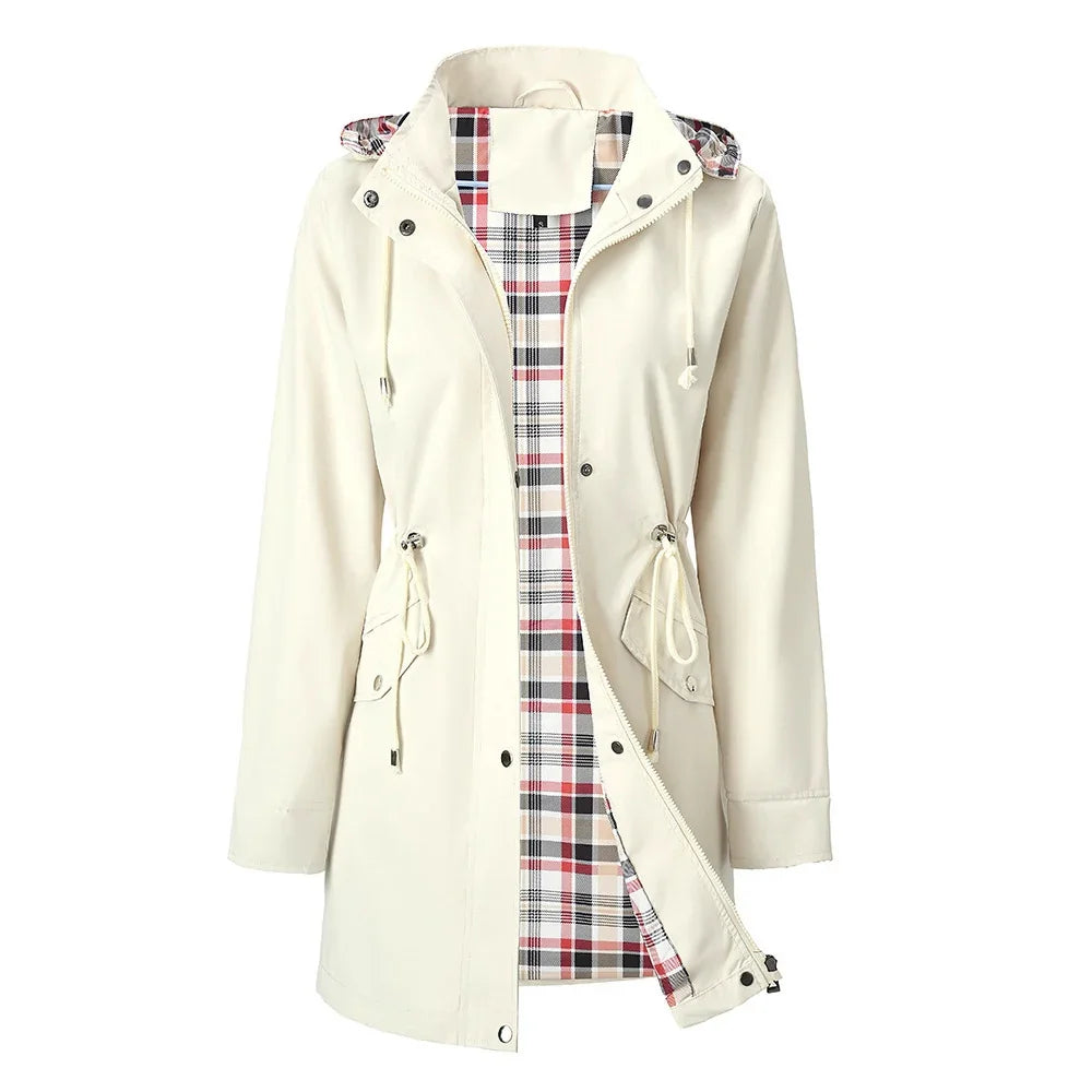 Women's cream long rain jacket with drawstring waist and red plaid lining inside