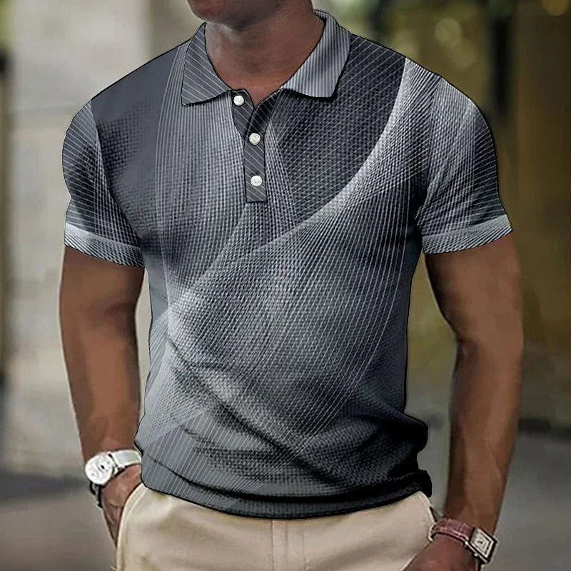 Man wearing black and gray abstract patterned polo shirt with beige pants, wristwatch, and bracelet