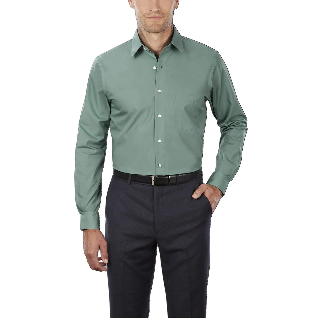 Man wearing green long-sleeve dress shirt with chest pocket and dark trousers