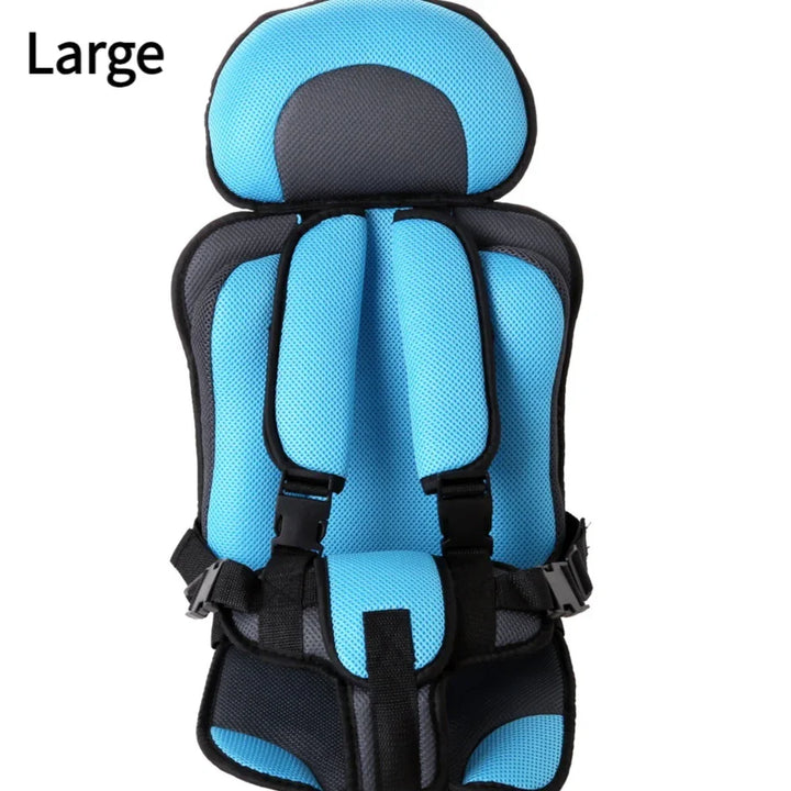 Large blue and gray padded child safety car seat with harness straps and adjustable buckles
