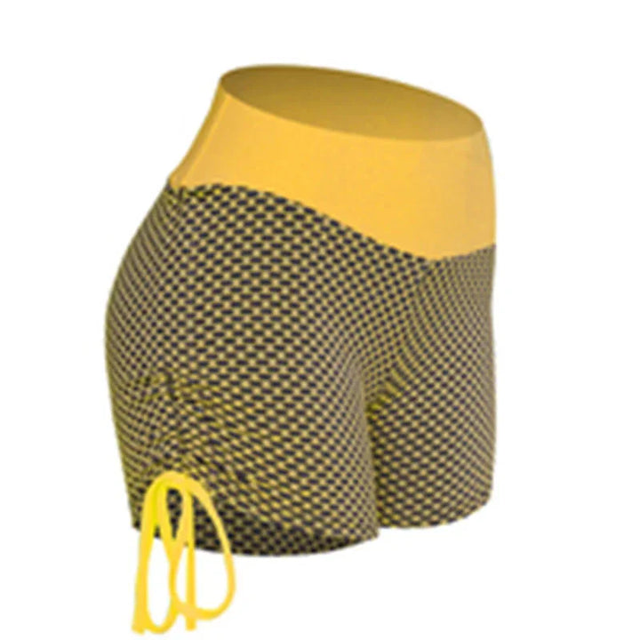 Yellow and black checkered shorts with adjustable side drawstrings on a mannequin