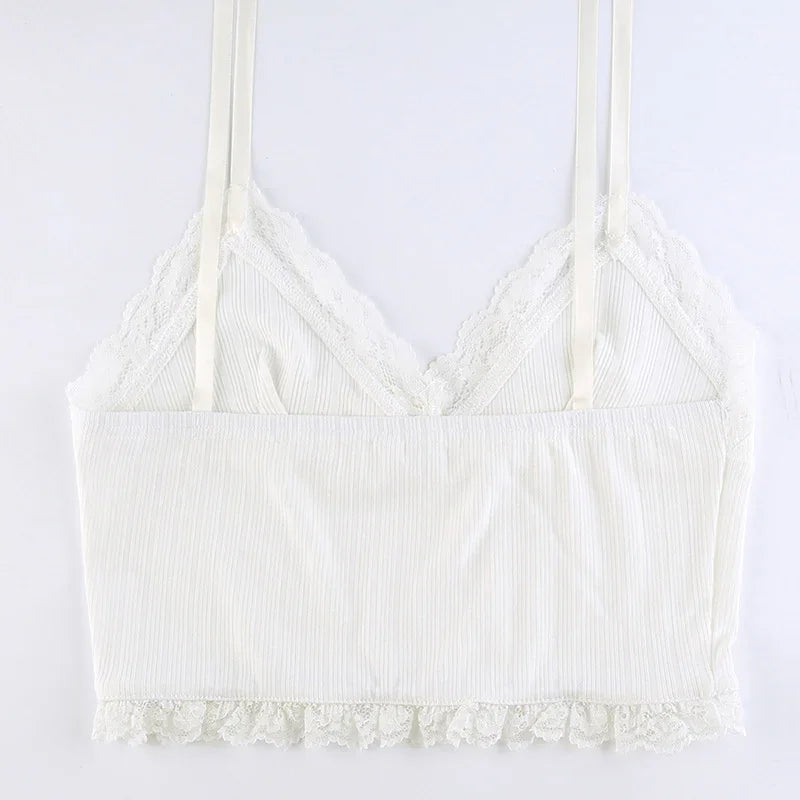 White ribbed crop top with lace trim and thin straps on a white background