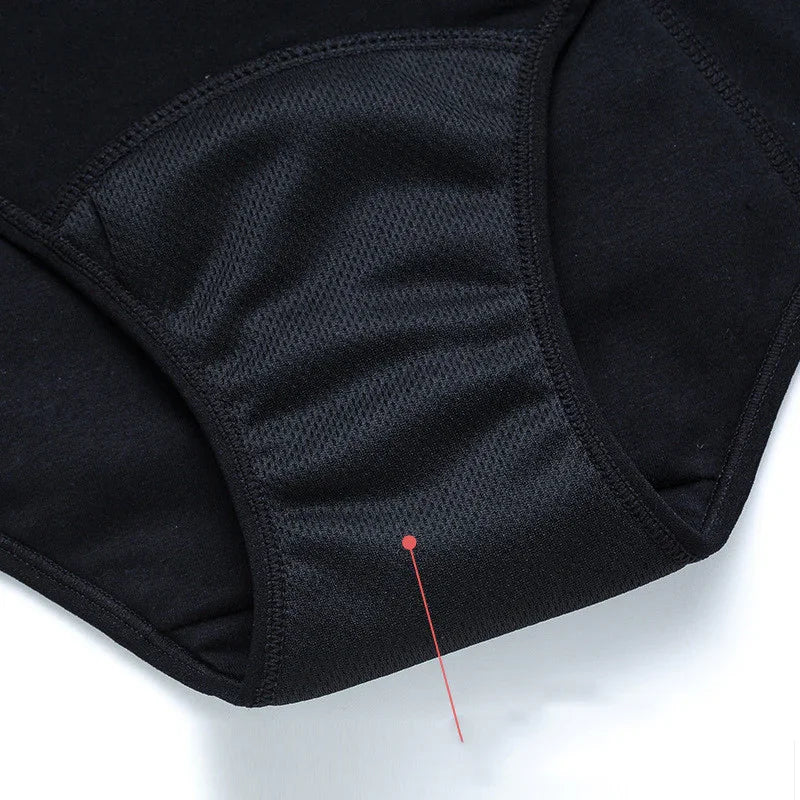 Close-up of black breathable mesh fabric on protective underwear detail with red pointer