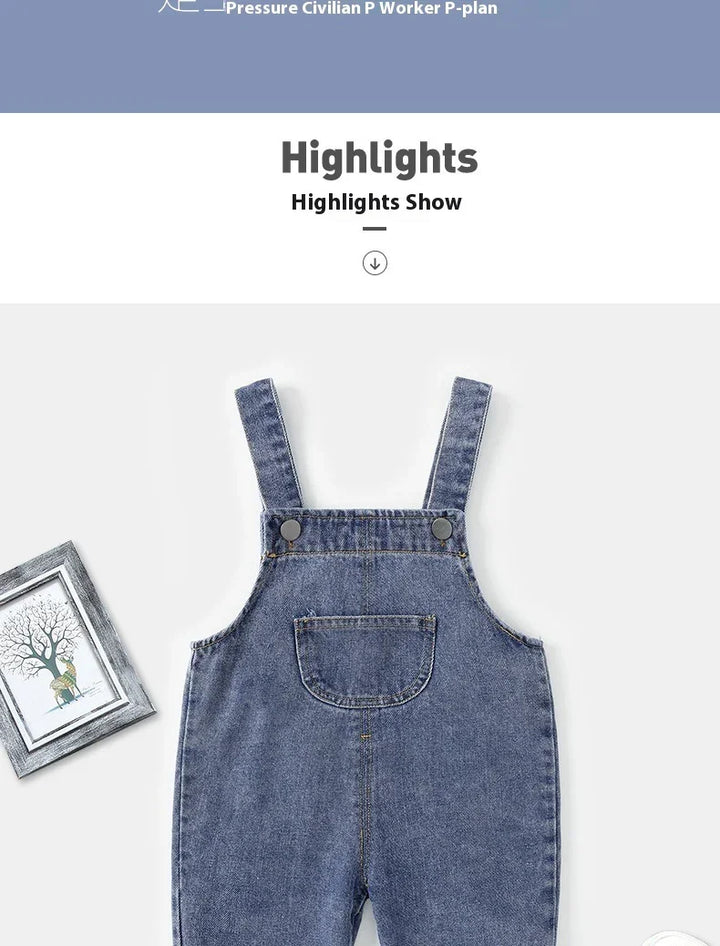 Blue denim toddler overalls with front pocket and metal buttons on white background