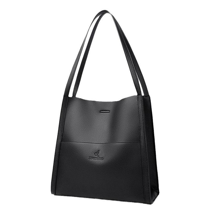 Black textured leather tote handbag with double shoulder straps and subtle embossed logo