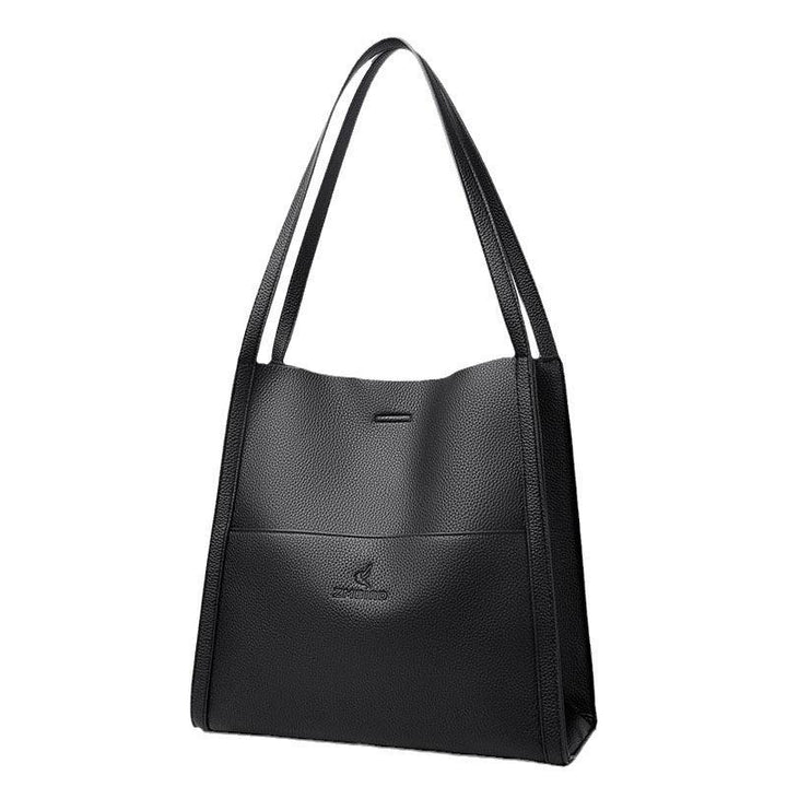 Black textured leather tote handbag with double shoulder straps and subtle embossed logo