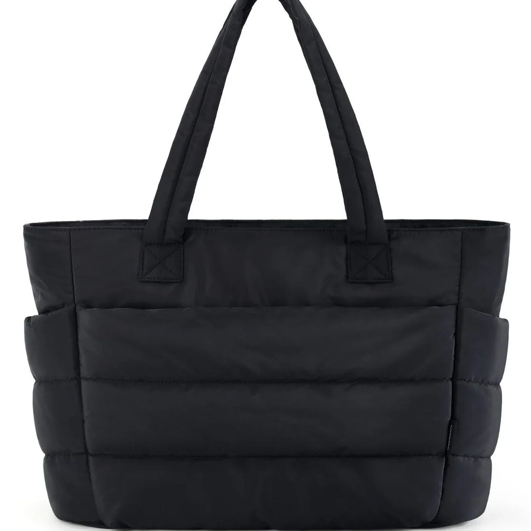 Black padded tote bag with dual handles and front pocket on white background