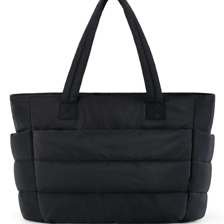 Black padded tote bag with dual handles and front pocket on white background