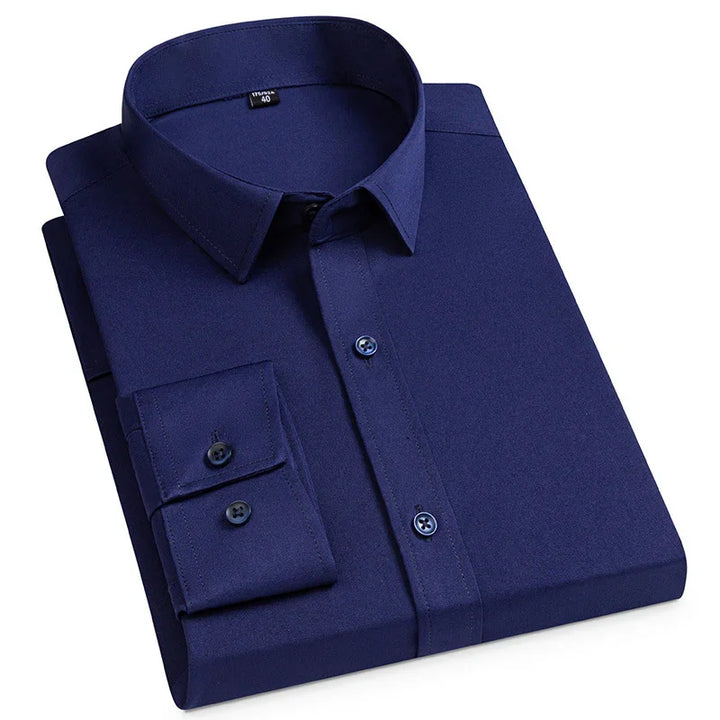 Folded navy blue men's dress shirt with buttoned cuffs and classic collar