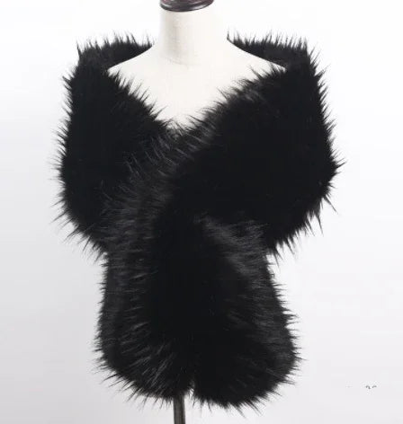 luxurious black faux fur stole wrapped on white mannequin against plain background