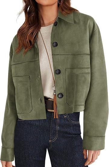 Woman wearing cropped green button-up jacket with front pockets and dark jeans