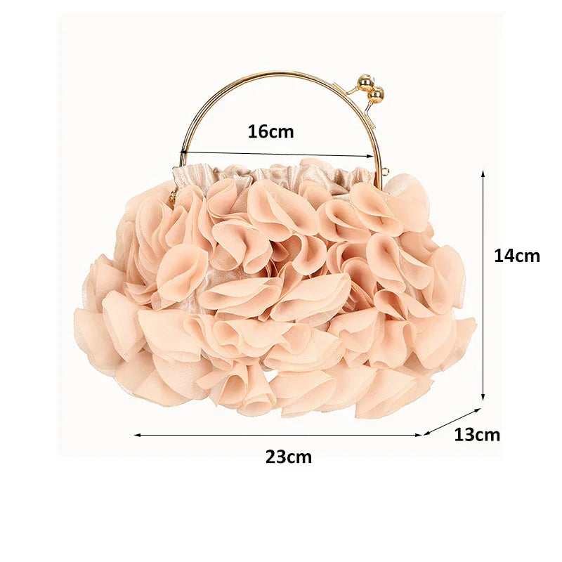 Beige floral fabric handbag with gold metal handle and size dimensions on white background