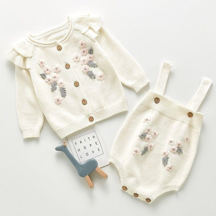 Cream baby knit cardigan with floral embroidery and matching romper with wooden buttons