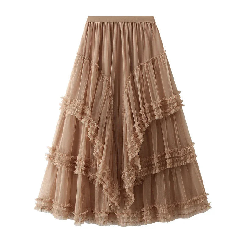 Beige layered tulle midi skirt with ruffled edges and elastic waistband on white background