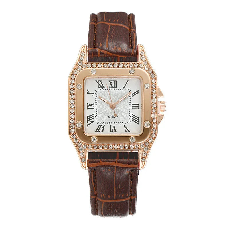 Square rose gold watch with rhinestone bezel and brown leather crocodile strap