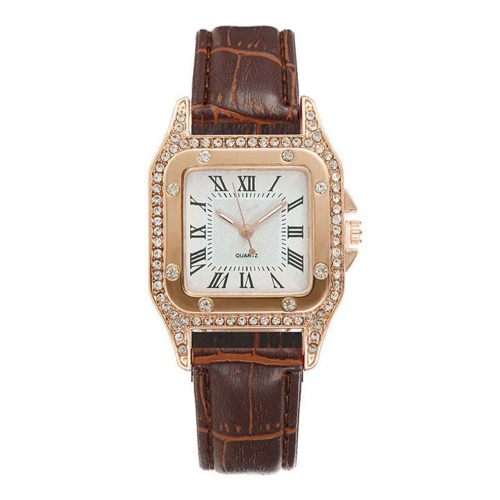Square rose gold watch with rhinestone bezel and brown leather crocodile strap