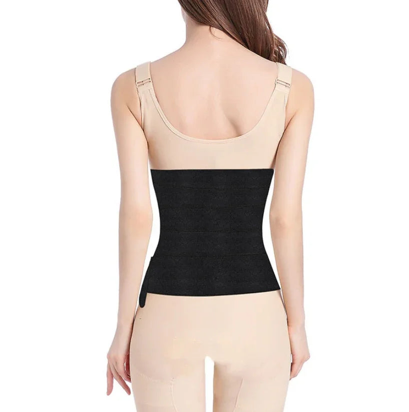 Woman wearing beige shapewear and black waist slimming belt from the back