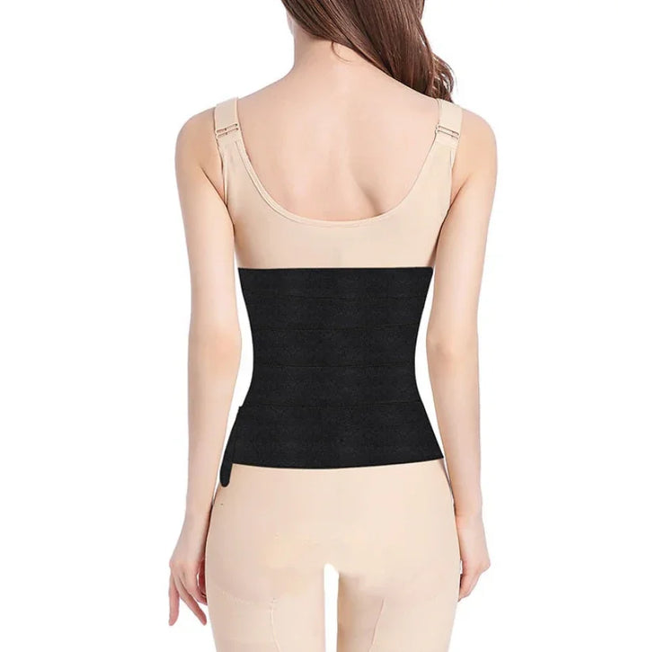 Woman wearing beige shapewear and black waist slimming belt from the back