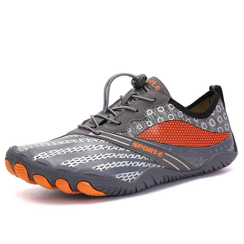 gray and orange lightweight sport water shoe with hexagonal mesh design and quick lace closure