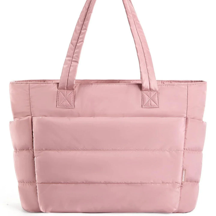 Soft pink padded tote bag with double handles and quilted design