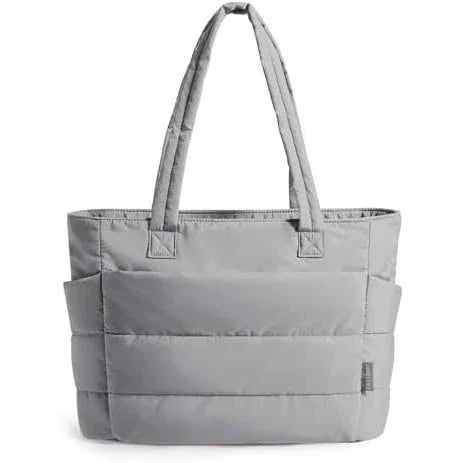 Gray padded tote bag with two handles and exterior side pockets on white background