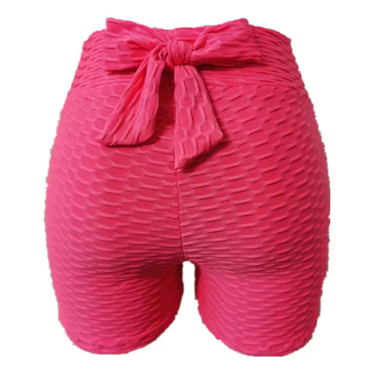 Textured pink high waisted shorts with back bow, seamless workout clothing