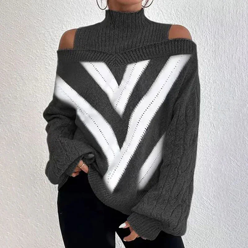 Dark gray cold shoulder sweater with white chevron pattern and balloon sleeves