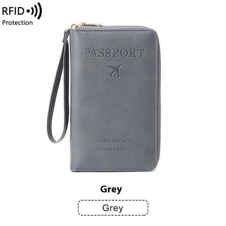 Grey RFID protection travel wallet with wrist strap, embossed passport design and airplane icon