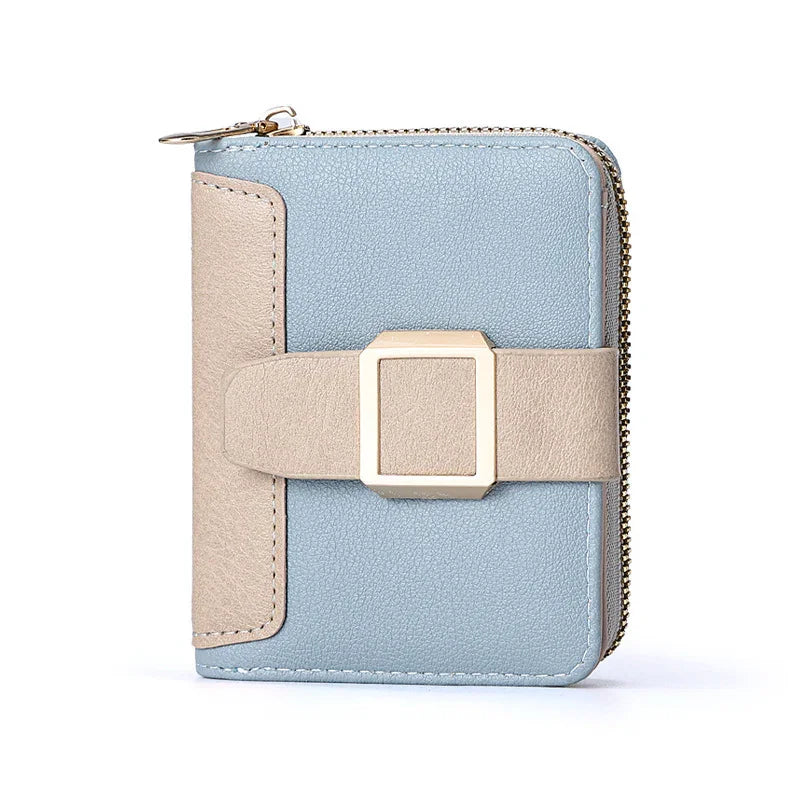Compact blue and beige leather wallet with gold-tone buckle and zipper closure