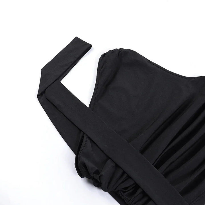 Black strapless corset top with a long wrap-around belt on white background
