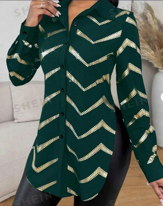 Green button-up long sleeve shirt with gold chevron sequin pattern worn with black pants indoors